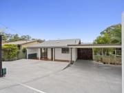 Charming Colonial Style Home with Dual Living Potential