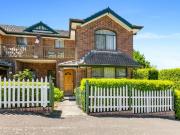 CHARMING END OF ROW ESCARPMENT VIEW TOWNHOUSE IN HEART...