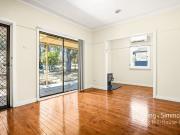 Charming Family Home with Spacious Backyard!