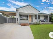 CHARMING, LOW MAINTENANCE LIVING IN IDEAL LOCATION