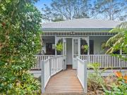 Charming Queenslander with Creek Frontage and Country Appeal