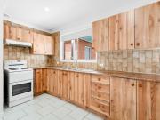 Charming Three Bedroom Residence With Superb Outdoor Area!