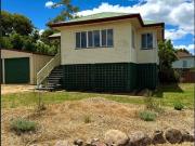 Charming Timber Home on a Private Leafy Corner Block