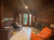 Charmosa casa de madeira no Condomínio Pasárgada Nova Lima