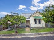 Circa 1920s Full Brick Classic with Enormous Potential