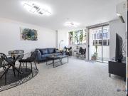 City Living Meets Modern Comfort with Rare Ground Floor...