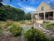 classic beach style home with pool