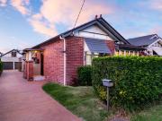 Classic bones, modern updates and large garage with retreat