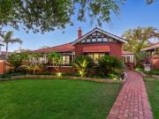 CLASSIC CHARACTER HOME IN A COVETED LOCATION!