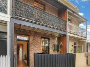 Classic Charm Meets Contemporary Living with potential...