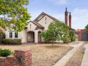 Classic English Style Home with Exceptional Potential