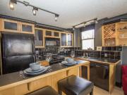 Clean furnished top floor corner unit