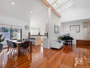 Coastal Character & Comfort in Coveted North One Mile Pocket
