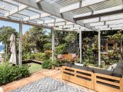 Coastal Charm Meets Rainforest Serenity