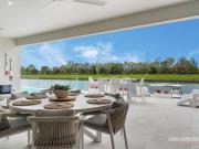 Coastal Luxe Waterfront Masterpiece | Triple Garage with...