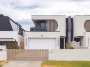 Coastal Luxury Redefined: Stunning Four Bedroom Home...