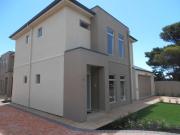 Coastal Townhouse Living Just Moments from the Beach!