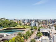 Cobertura semimobiliada para alugar no Menino Deus com 4...