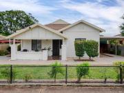 Come home to character charm and a dual driveway