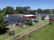 Complejo de 3 cabañas en venta Parque Lago Permuta por...