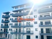 Comprar apartamento T4 novo com piscina e garagem em Olhão