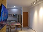 Conforto na Praia Grande: Apto c/ Piscina Dupla e Sauna