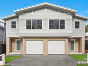 Contemporary 3 Bedroom Townhouse Offering Comfort and...