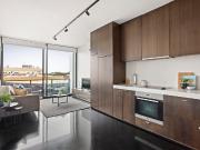 Contemporary apartment metres to beach with rooftop terrace