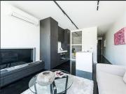 Contemporary apartment metres to beach with rooftop terrace