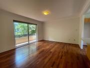 Contemporary beachside apartment blending modern design...