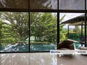 Contemporary bungalow with full glass exterior