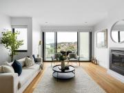 Contemporary Coastal Elegance with Bay Glimpses