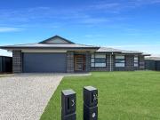 Contemporary Coastal Living in the Coveted Moonee Beach...