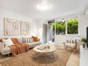 Contemporary Comfort in a Quiet Elwood Block