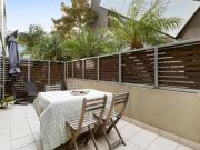 Contemporary Comfort Meets Courtyard Calm