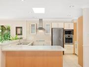 Contemporary family home in lush garden setting