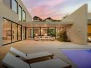 Contemporary house with pool and garden