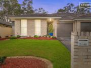 Contemporary low maintenance single level duplex
