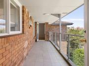 Contemporary apartment oasis with indoor/outdoor flow in...