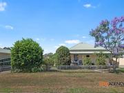 CONVENIENTLY LOCATED STARTER HOME OR INVESTMENT