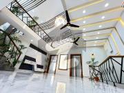 Corner house with mezanine floor