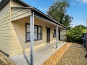 COTTAGE ON LOW MAINTENANCE BLOCK
