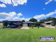 Country living in a beautiful lowset brick home