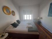 Cozy bedroom in a 7 bedroom apartment in Rua Quirino da...