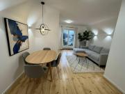 Dachgeschoß mit Terrasse und Grünblick in klassischer...