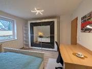 Dachgeschosswohnung mit Gartennutzung und Balkon in...