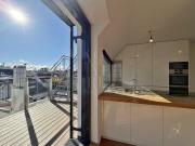 Dachterrassenwohnung im Servitenviertel mit Garage