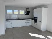 Dans immeuble récent attique de 3.5 pièces