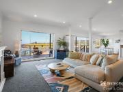 Delightful Waterfront Retreat with Panoramic Ocean Views