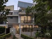 Deluxe waterfront retreat in an expansive tri level...